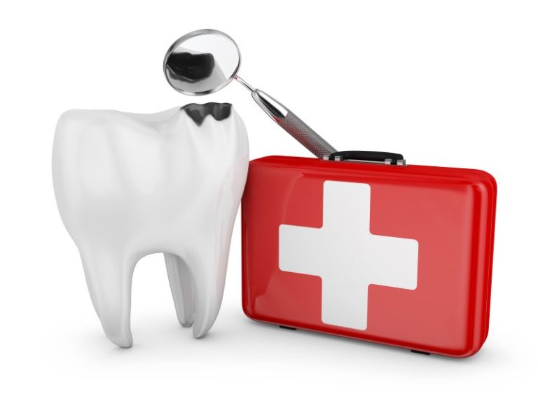 Tooth with emergency dental kit