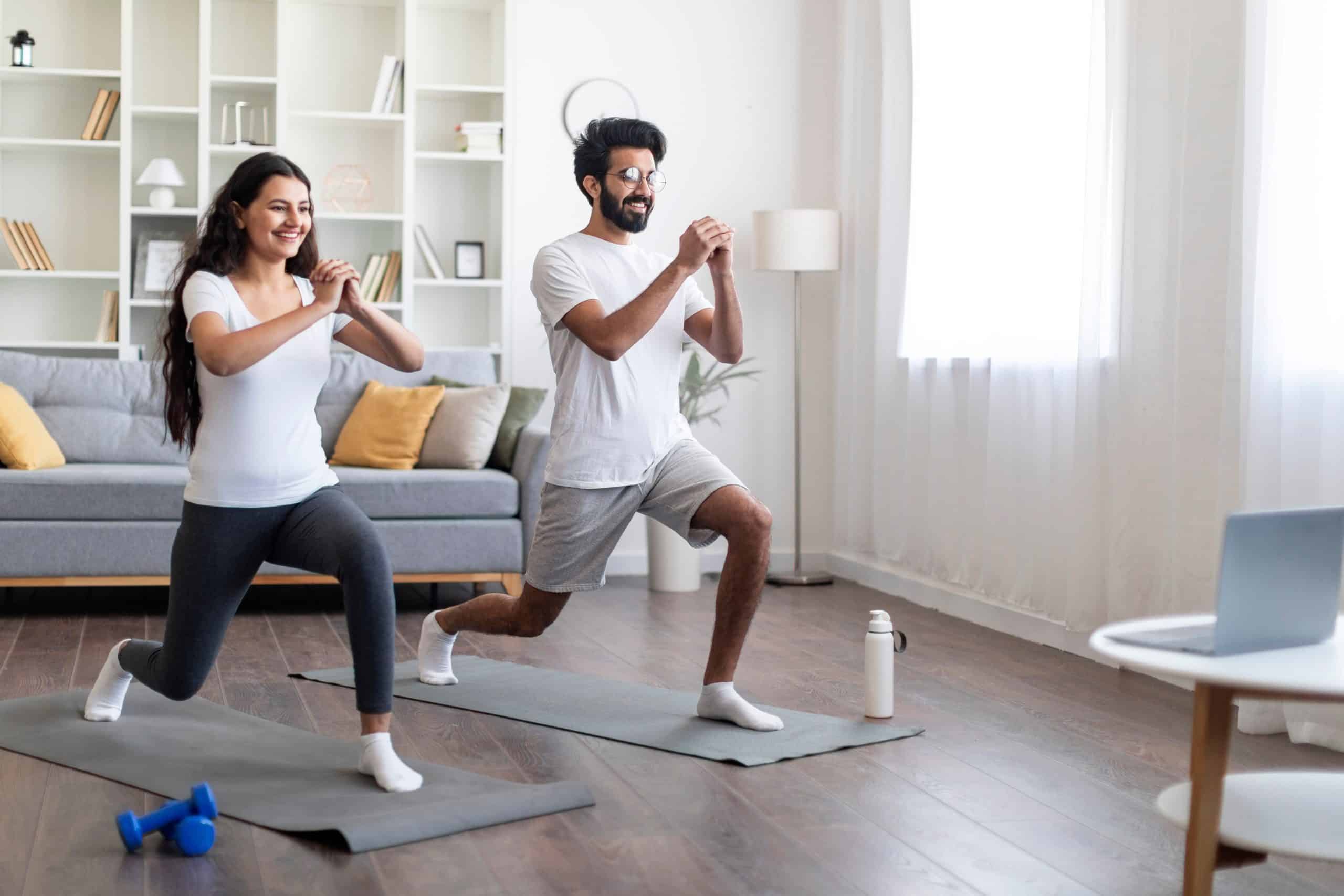 couple at home doing a workout together