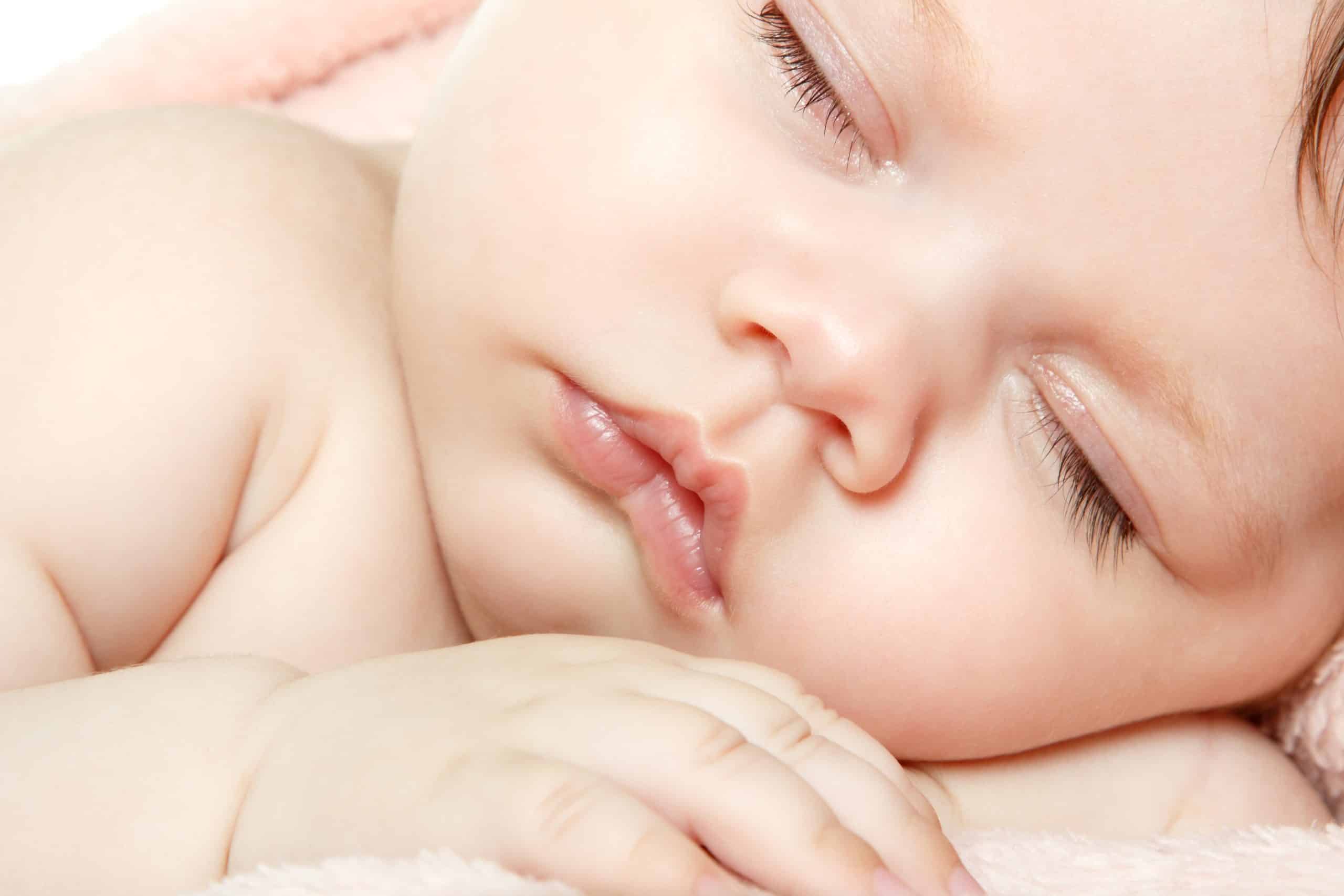 Baby sleeping with perfectly pouted lips