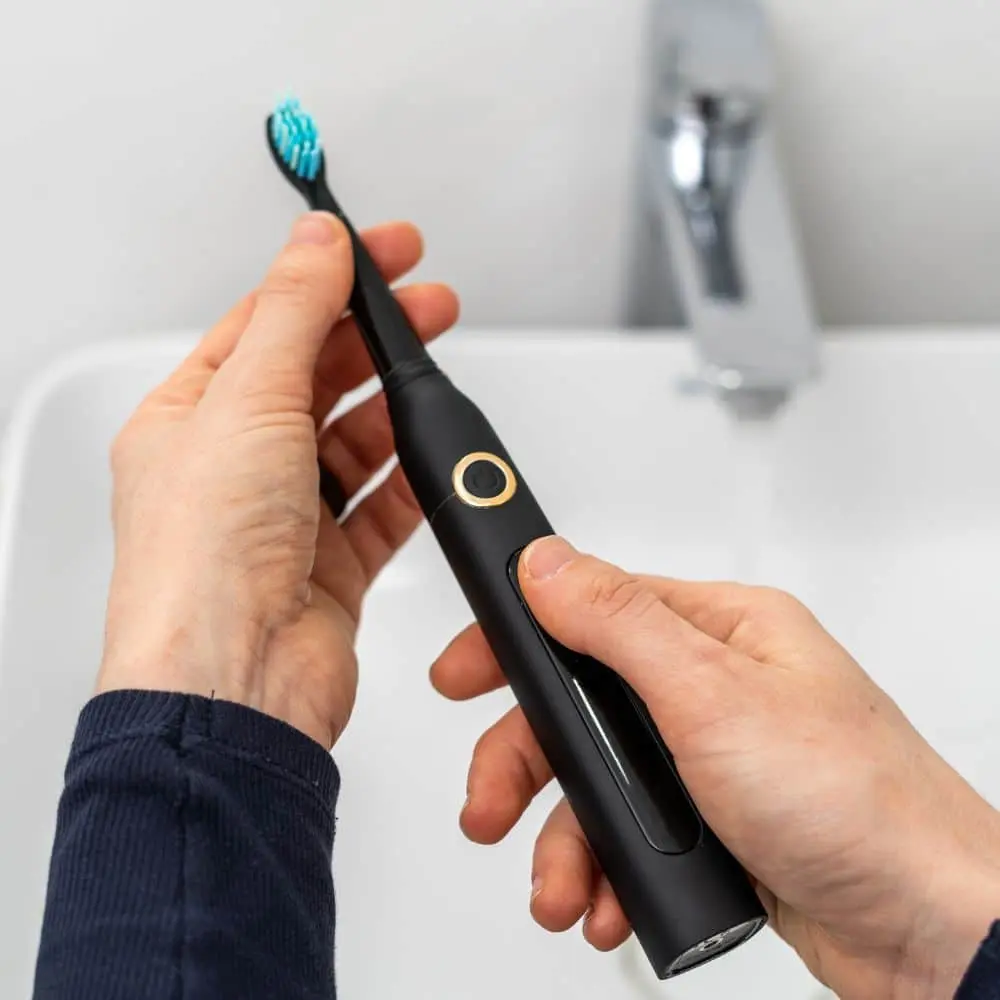 Dental hygienist providing a professional teeth cleaning