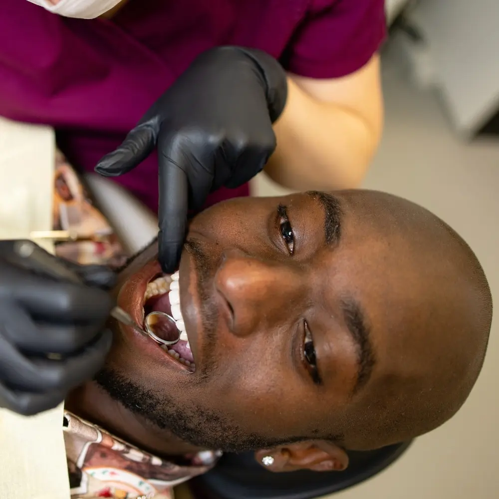 Custom dental crown restoring a damaged tooth