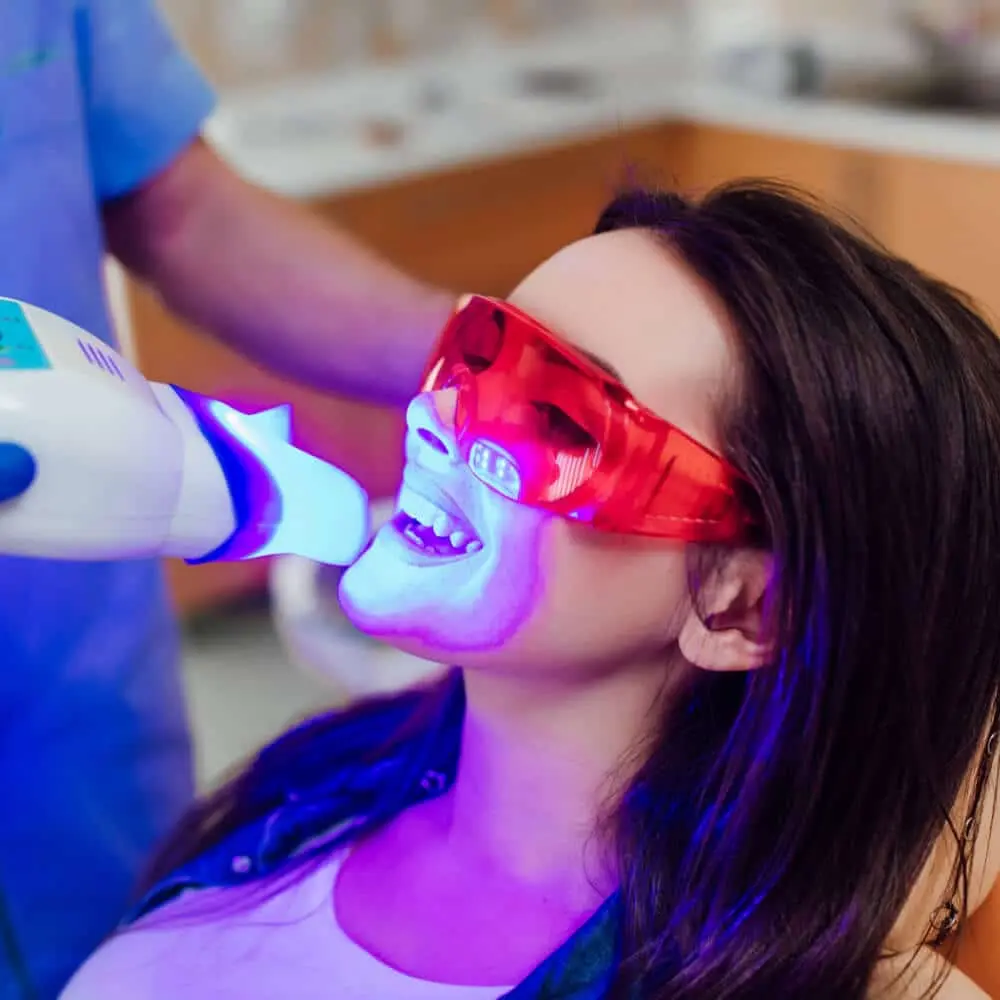 Professional teeth whitening treatment performed in a dental office